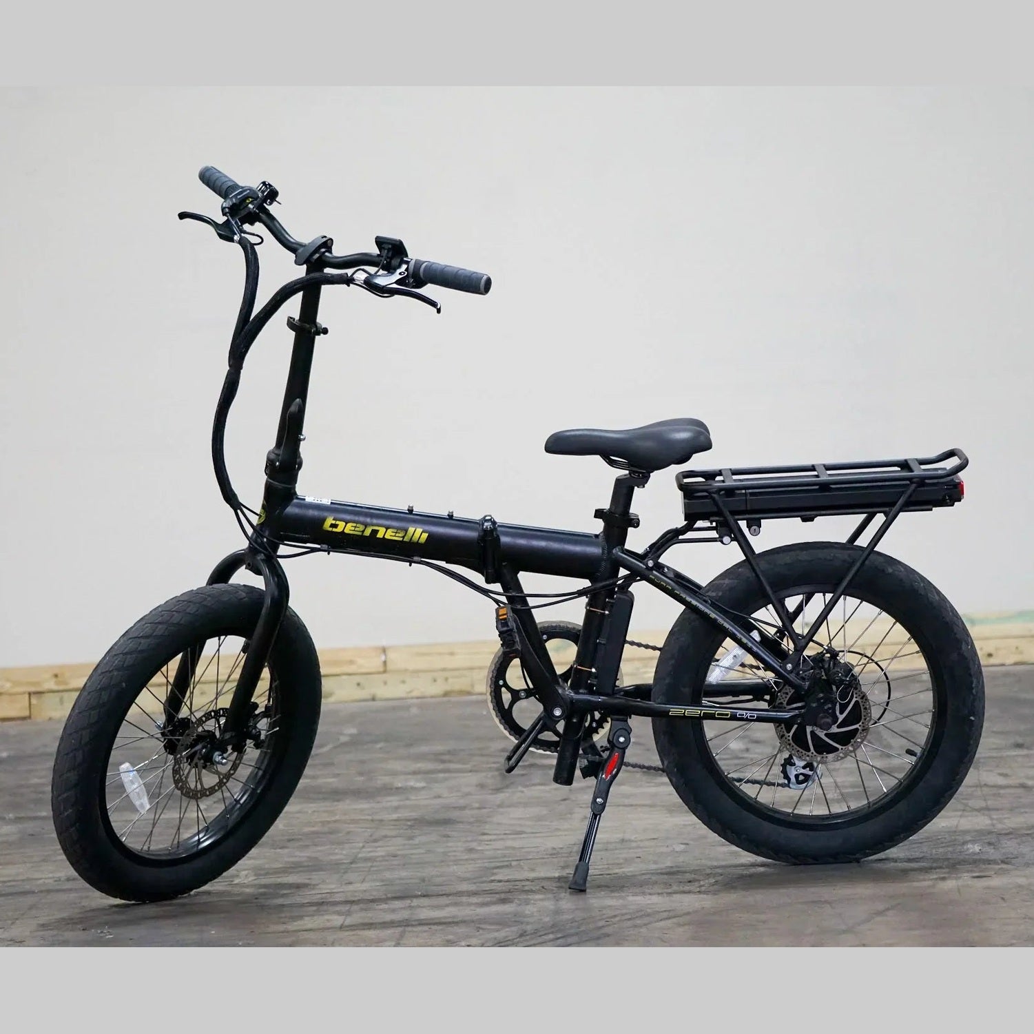 Black Benelli Zero 50 folding electric bike with fenders and integrated battery