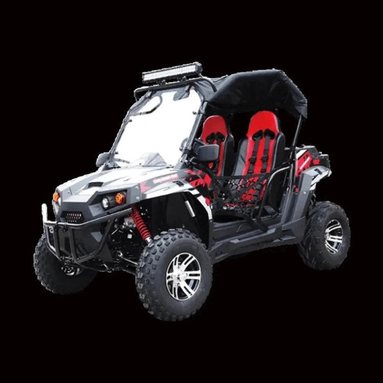 Four-seater grey and red UTV with racing seats, red suspension springs, and clear windshield