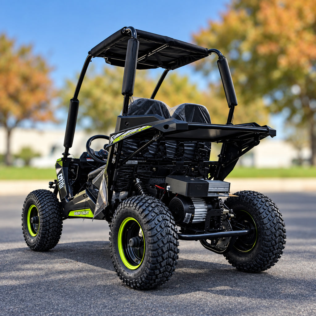 Black TrailMaster Cheetah i6 electric kart outdoors featuring yellow rims and side accents
