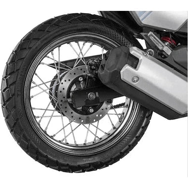 Knobby tire, disc brake, and exhaust muffler detail on Lifan KPM200 rear wheel