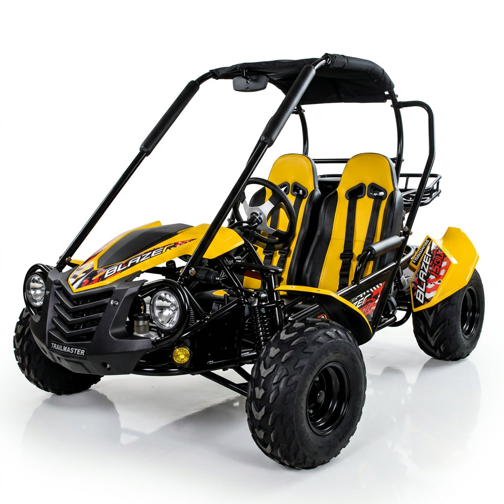 Yellow open-frame TrailMaster Blazer i2K go kart with canopy frame and knobby tires