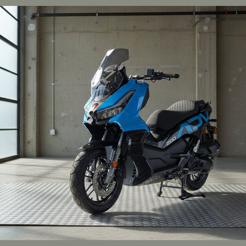 Front view of blue Amigo 200 ADV scooter with Italian flag decal and angular fairing