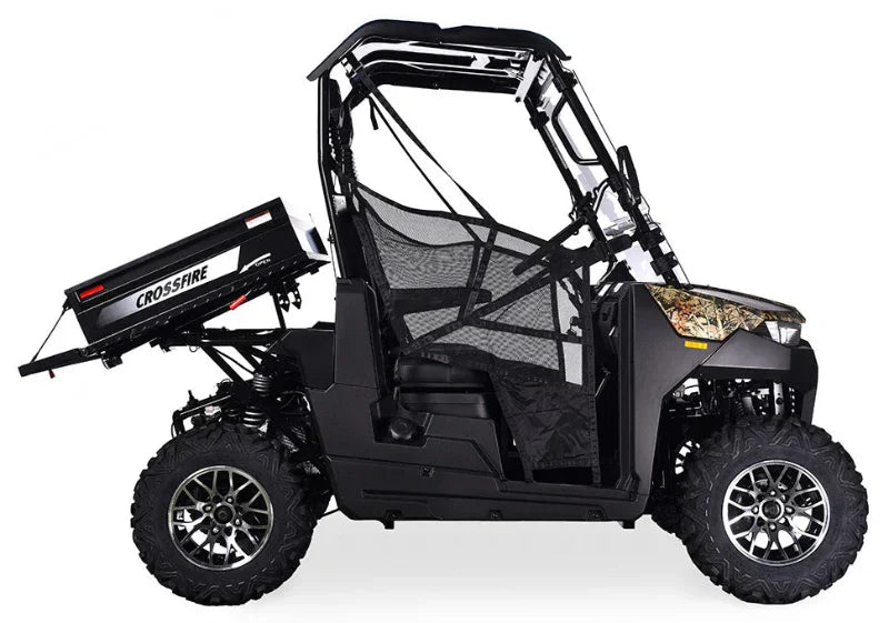 Side view of a Crossfire 200 UTV with lifted dump bed and rugged off-road tires