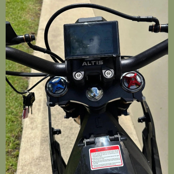 digital display and gauge cluster on black Atlis Sigma electric dirt bike handlebars