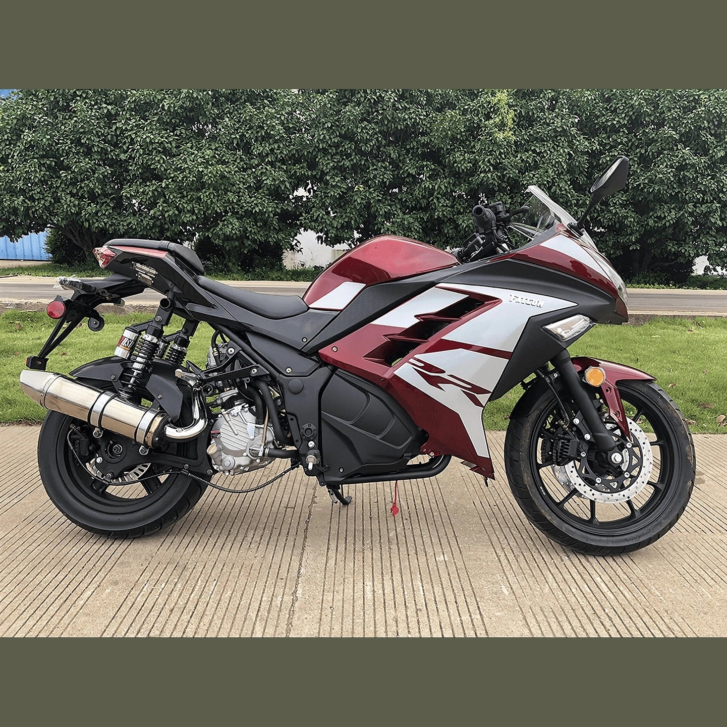 Maroon and white Apollo Falcon XR 250 EFI automatic motorcycle scooter side profile