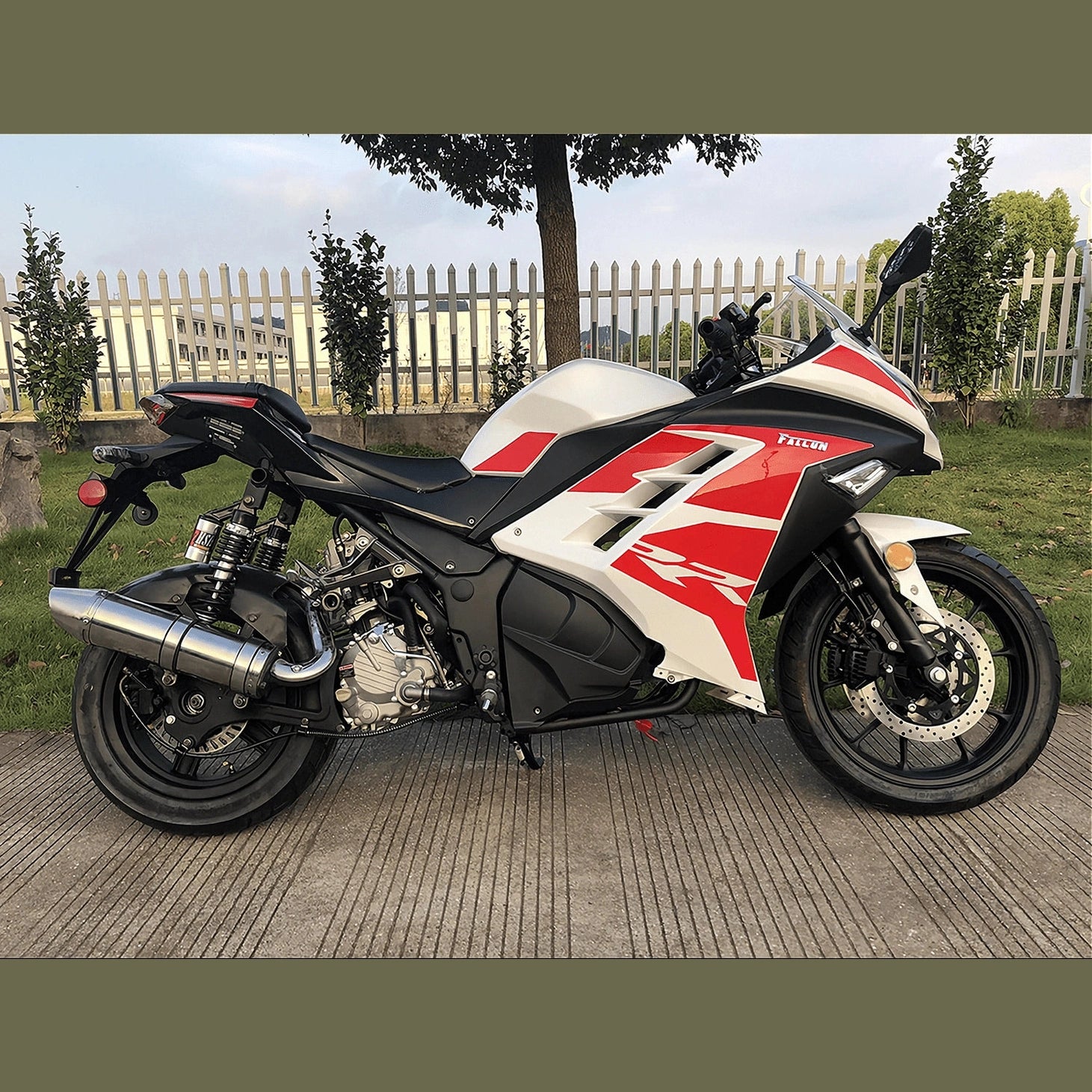White and red Apollo Falcon XR 250 automatic motorcycle scooter on kickstand