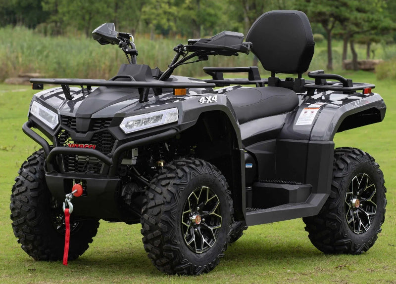 Vitacci MAXIMUS 450L 4x4 ATV with rugged tires and rear cargo rack, parked on grass