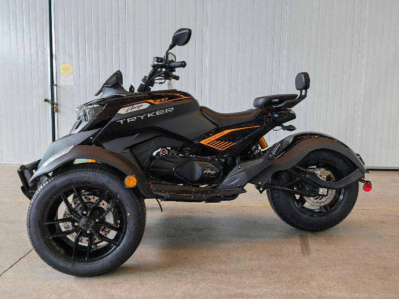 Black Amigo Tryker 300cc trike with orange accents and disc brakes