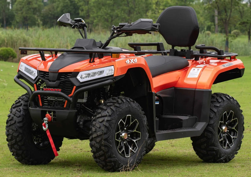 Orange vitacci  MAXIMUS 450CC efi 4x4 ATV with black accents, rugged tires, and rear cargo rack on grassy field