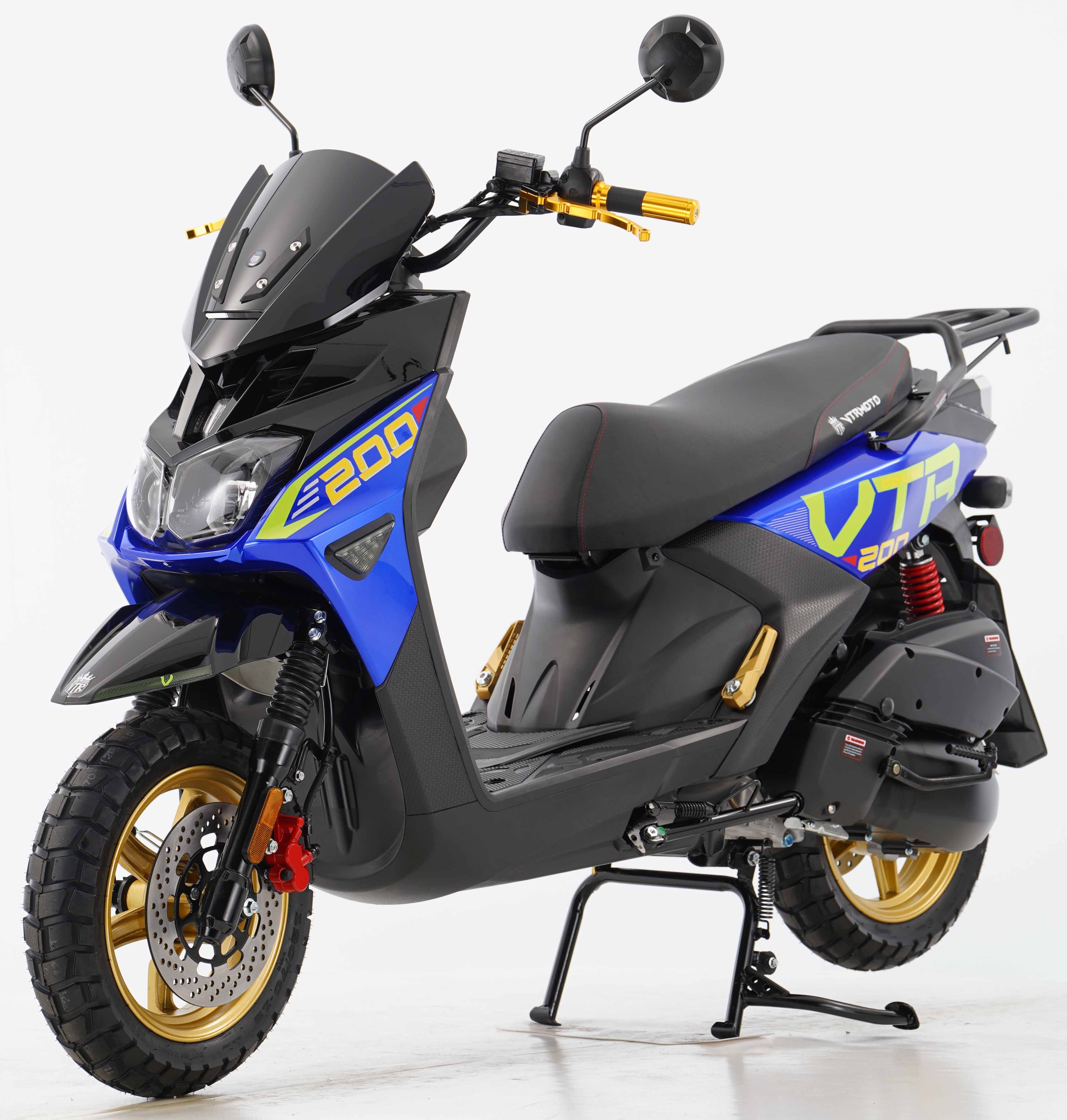 Blue and black VTR 200 scooter with gold rims and red suspension shock