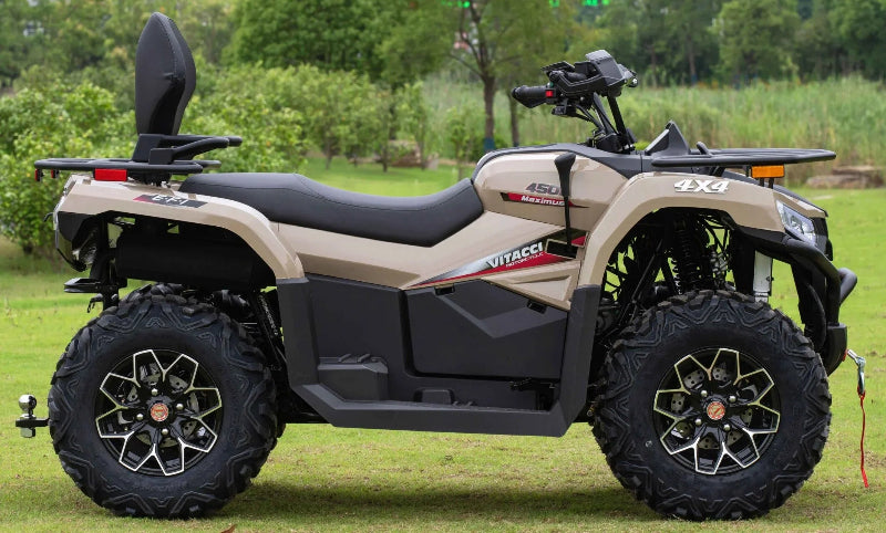 Beige Vitacci Maximus 450cc 4x4 ATV with black seats and rugged tires on grass