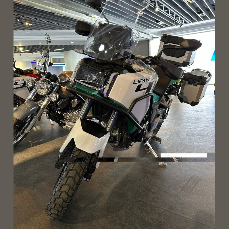 Front view of white Lifan KPT 400 with crash bar and knobby off-road tires