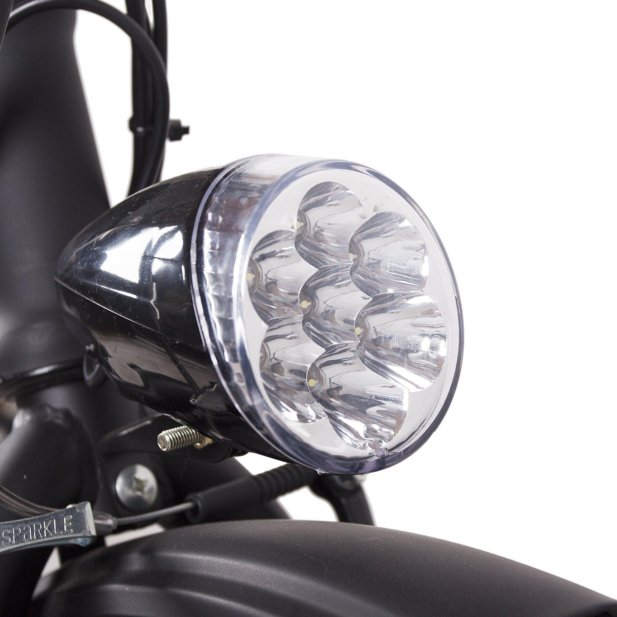 Teardrop LED headlight assembly with clear lens on handlebar