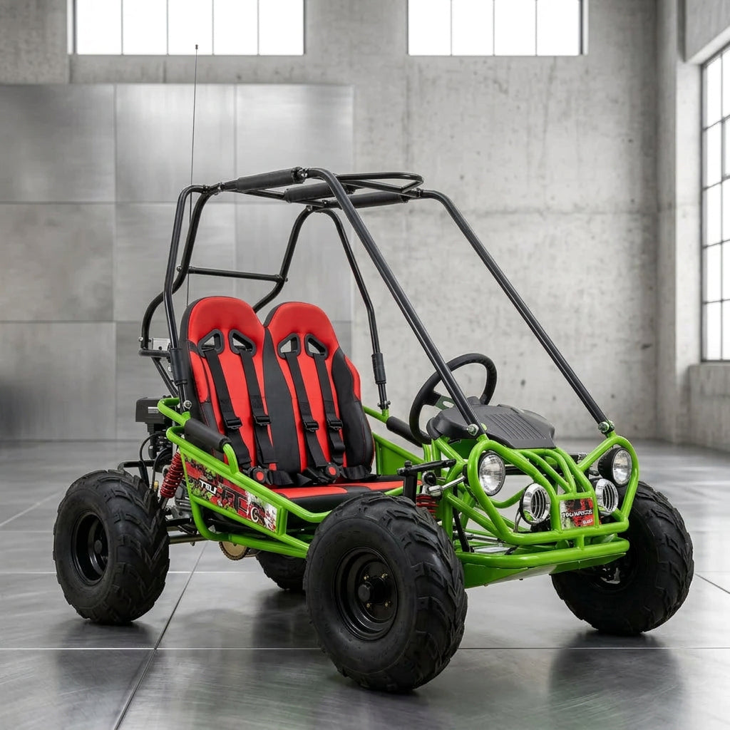 Green TrailMaster Mini XRX+ kids go-kart parked outdoors on pavement